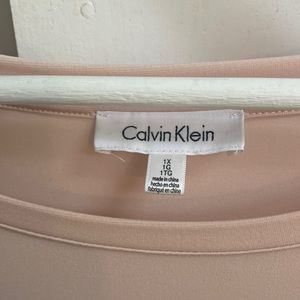 Soft pink blouse. Dressy fabric. Lays beautifully.